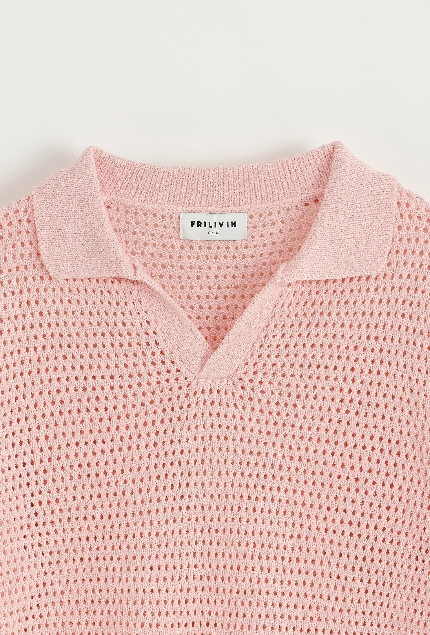 Polo troué uni à manches courtes