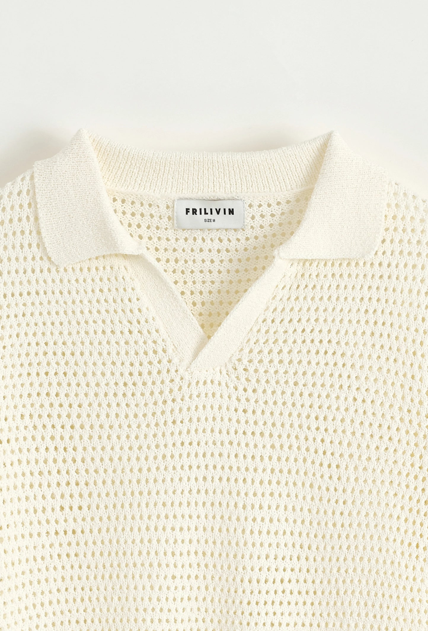 Polo troué uni à manches courtes