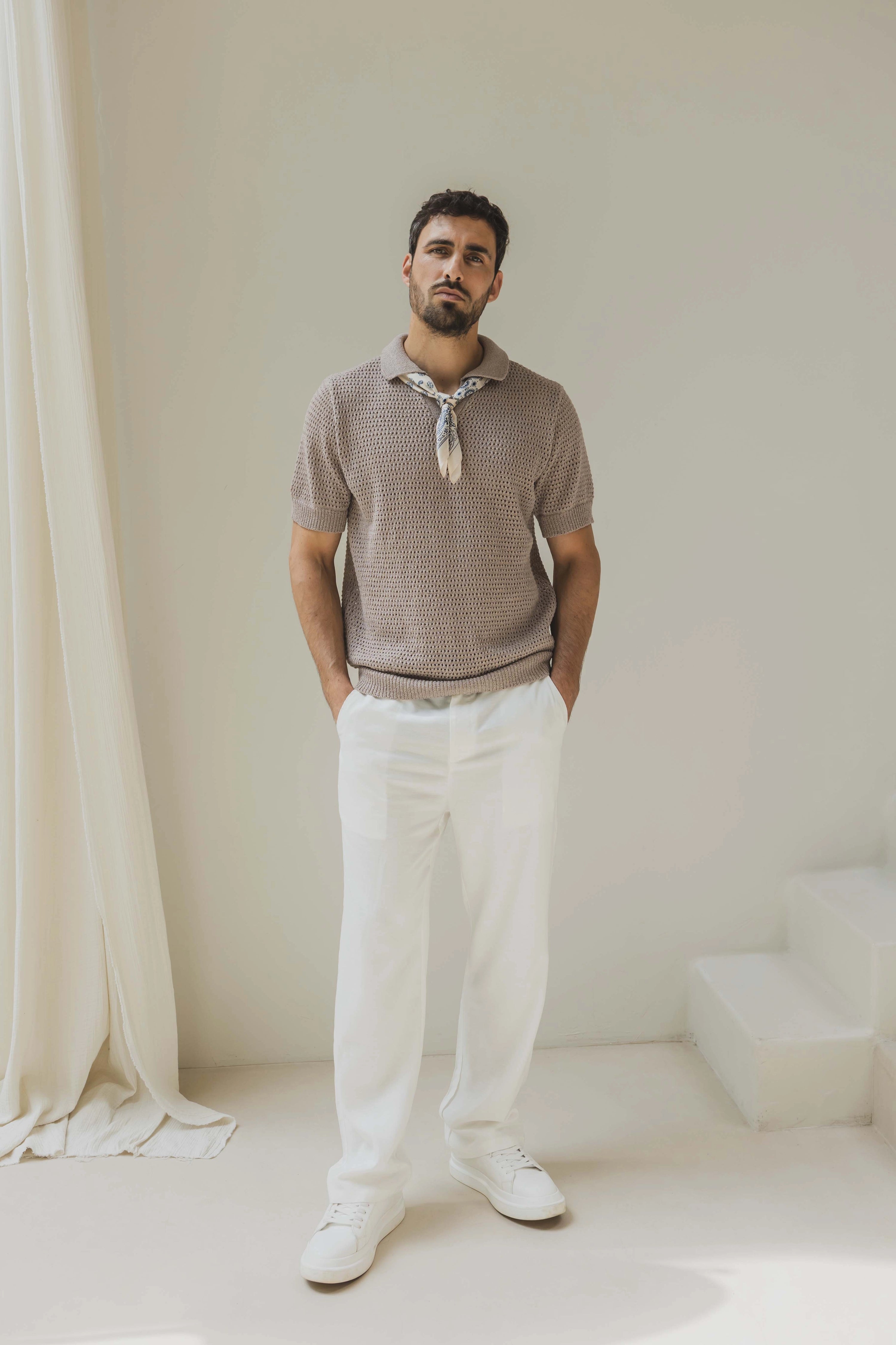 Polo troué uni à manches courtes