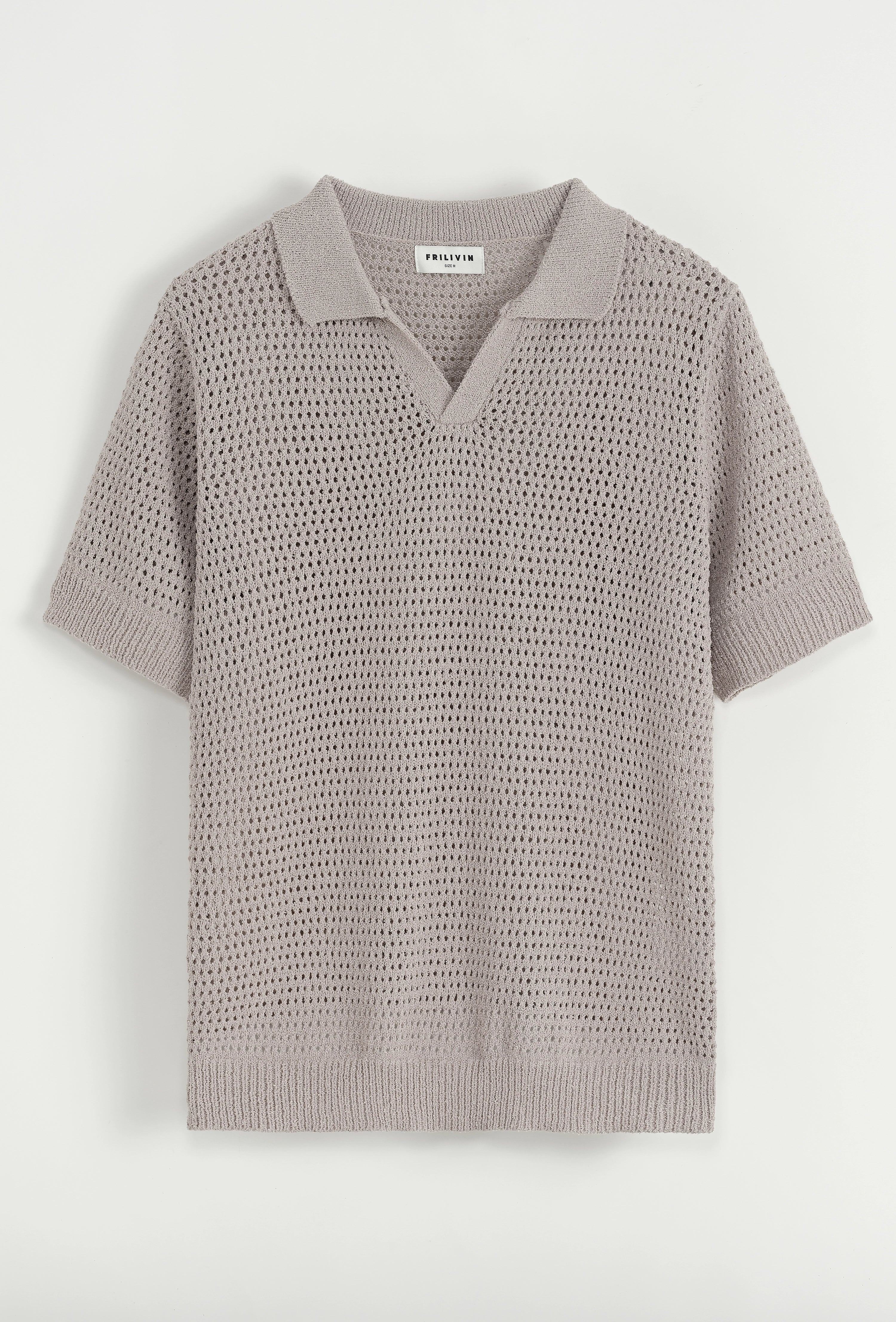 Polo troué uni à manches courtes