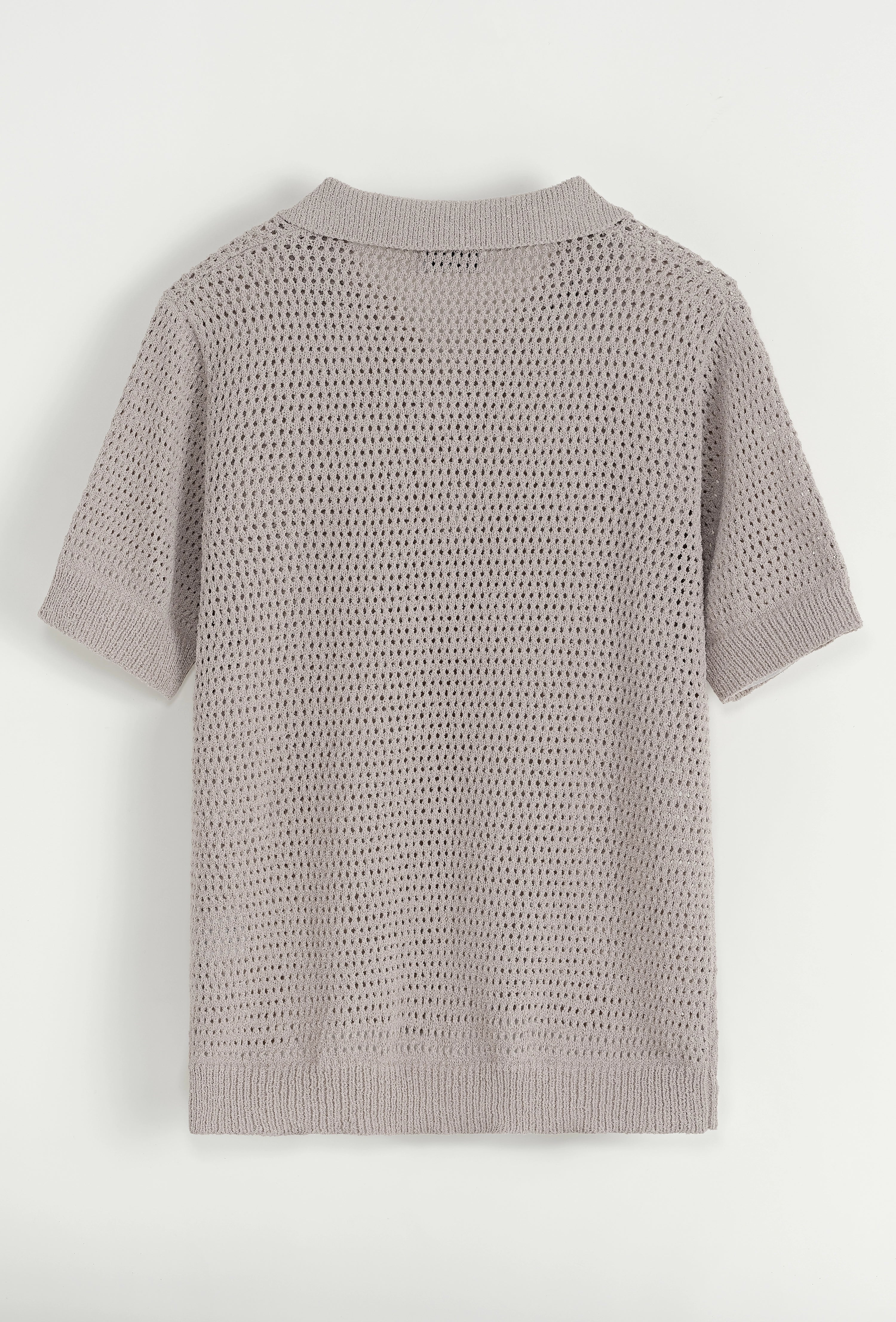 Polo troué uni à manches courtes