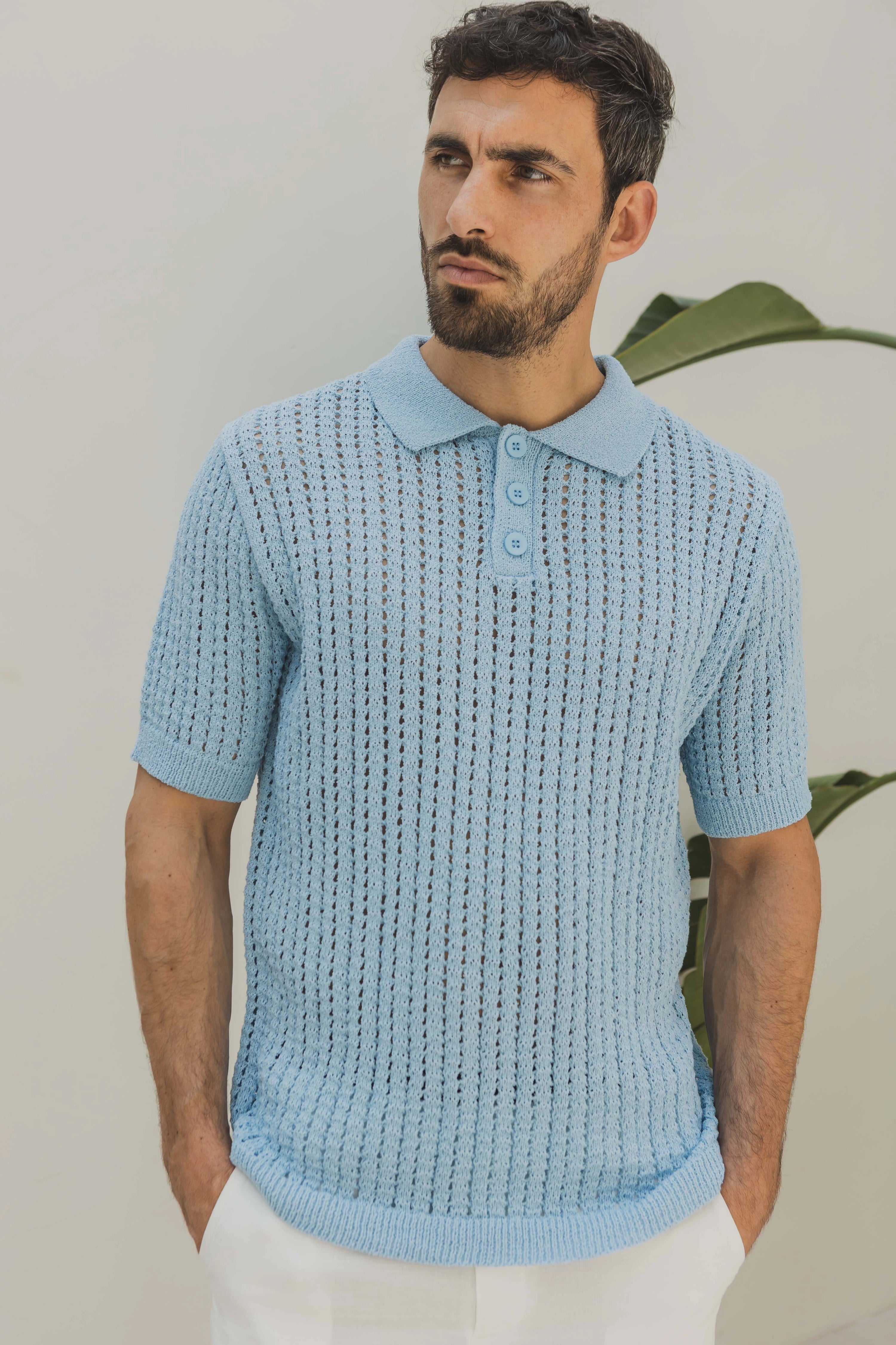 Polo troué uni à manches courtes