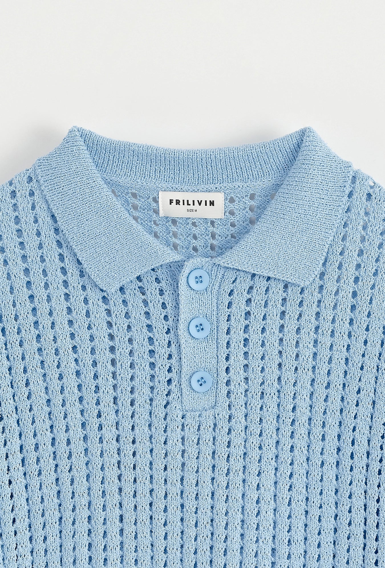 Polo troué uni à manches courtes