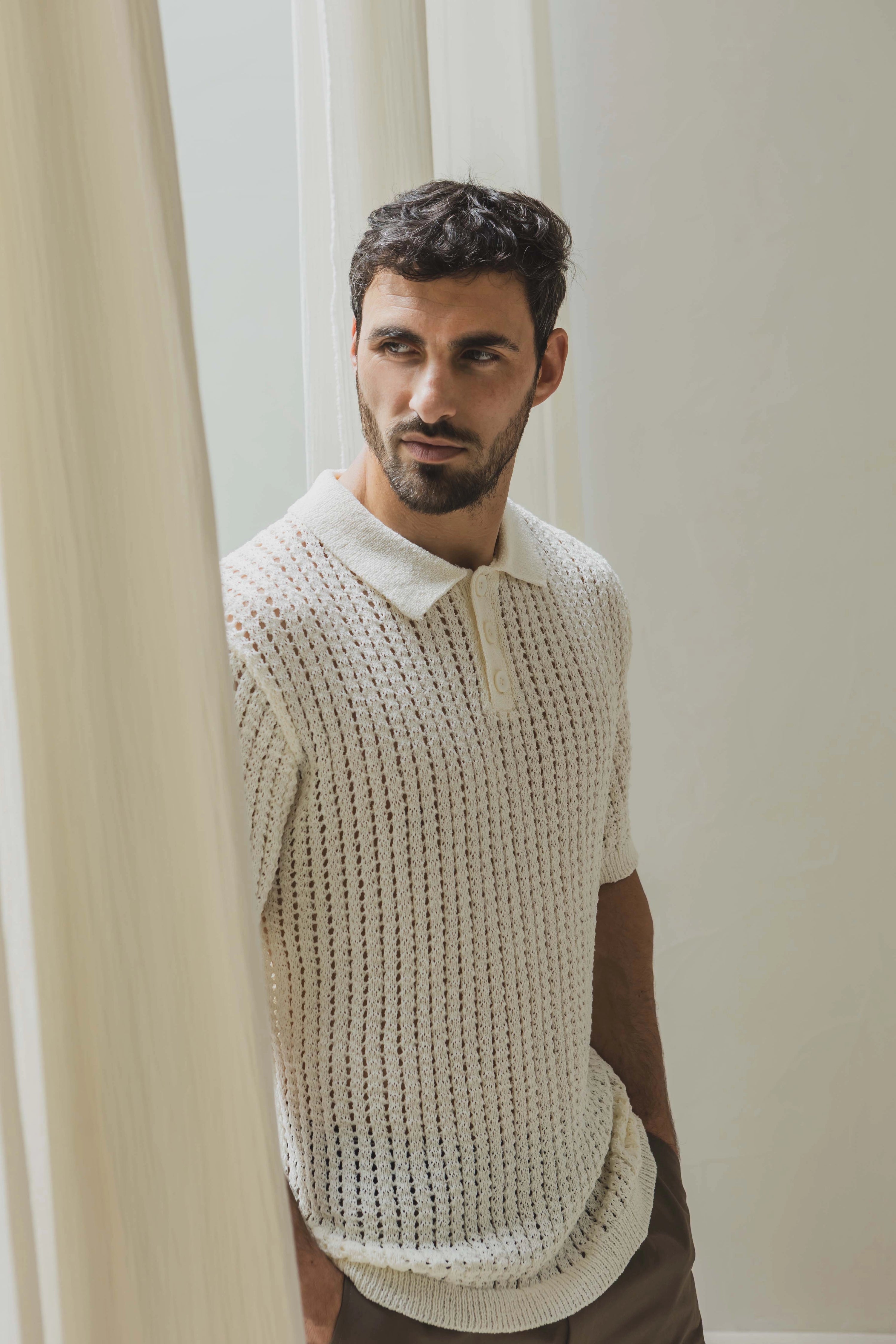 Polo troué uni à manches courtes