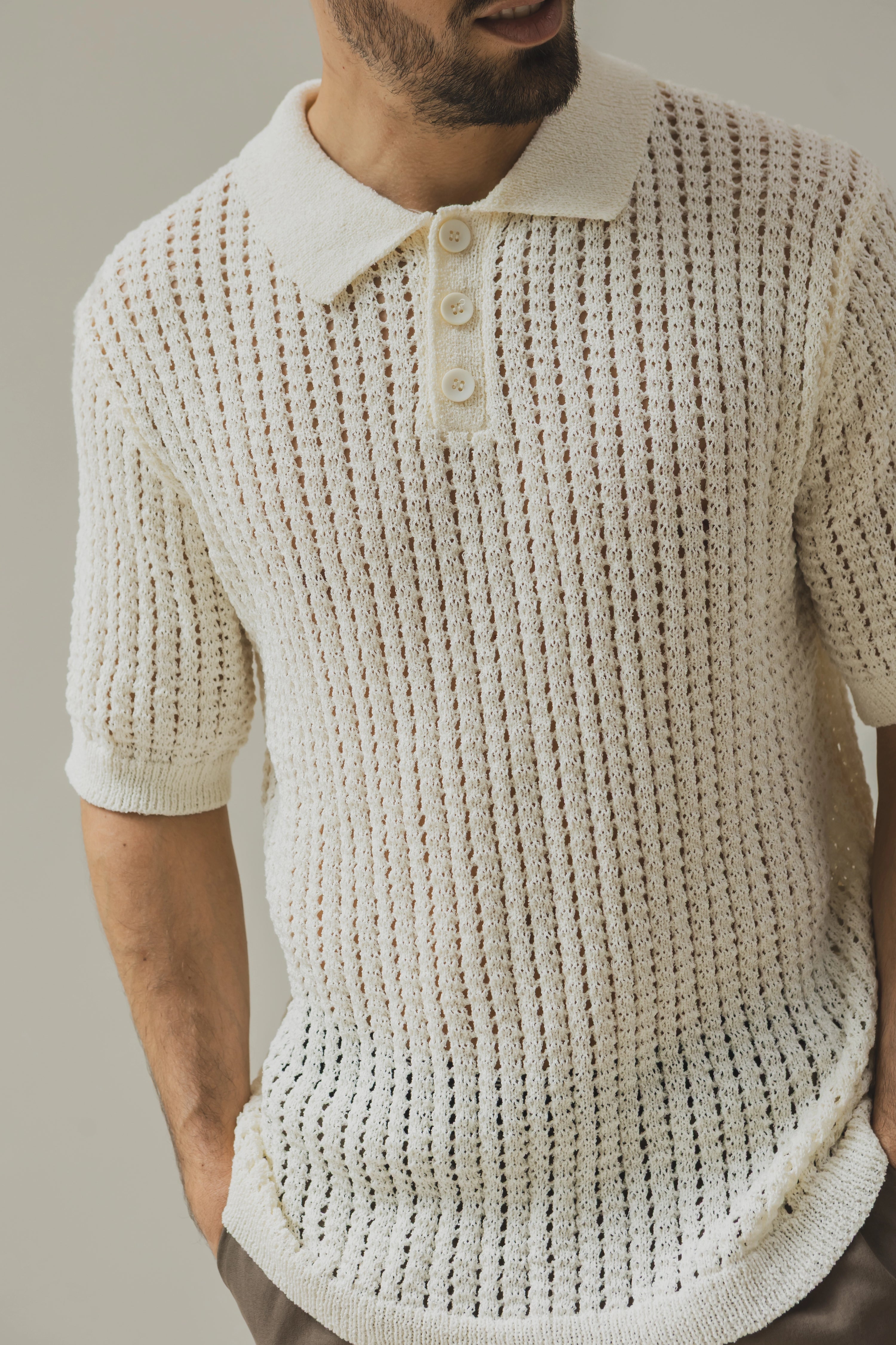 Polo troué uni à manches courtes