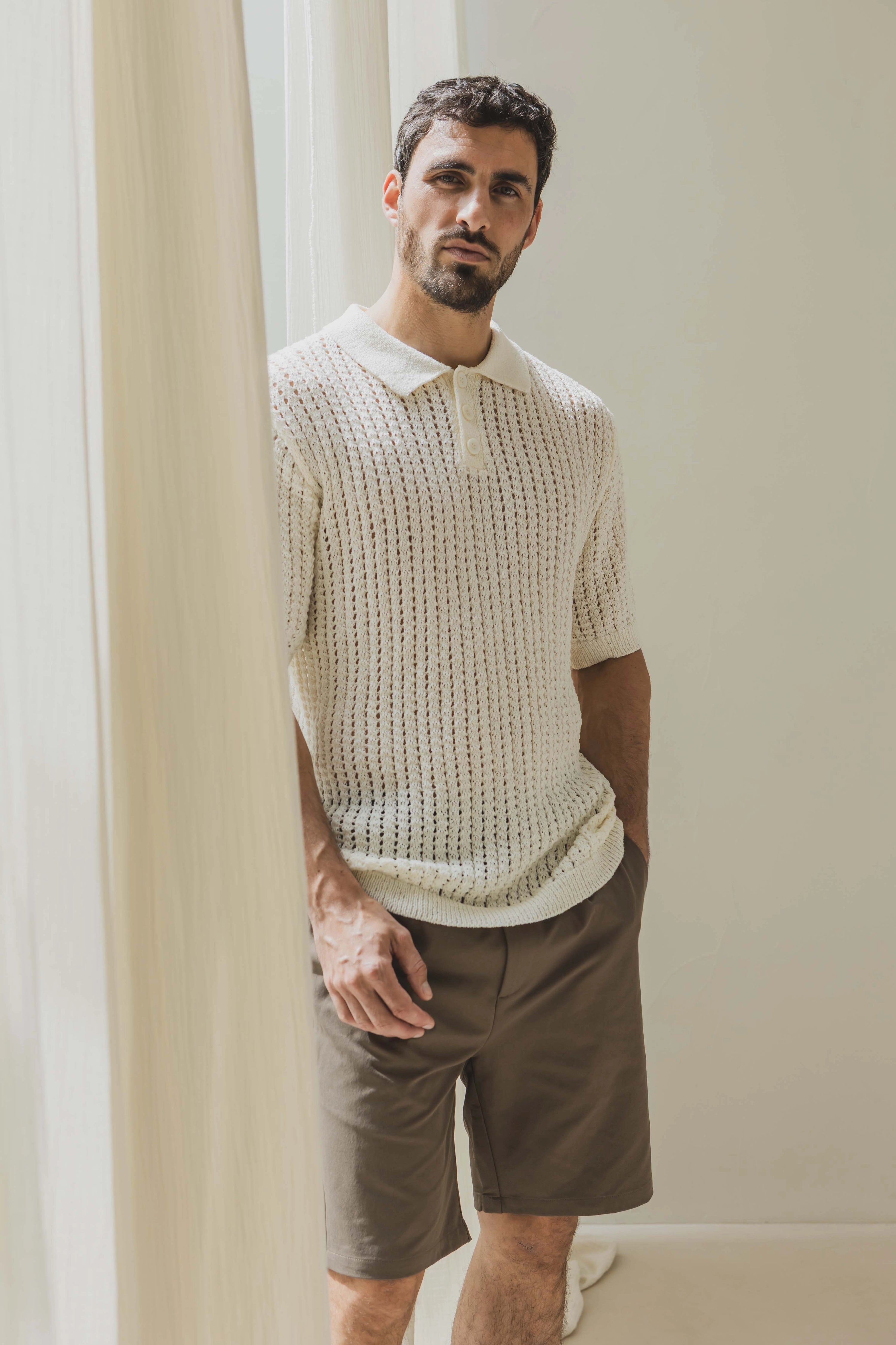 Polo troué uni à manches courtes