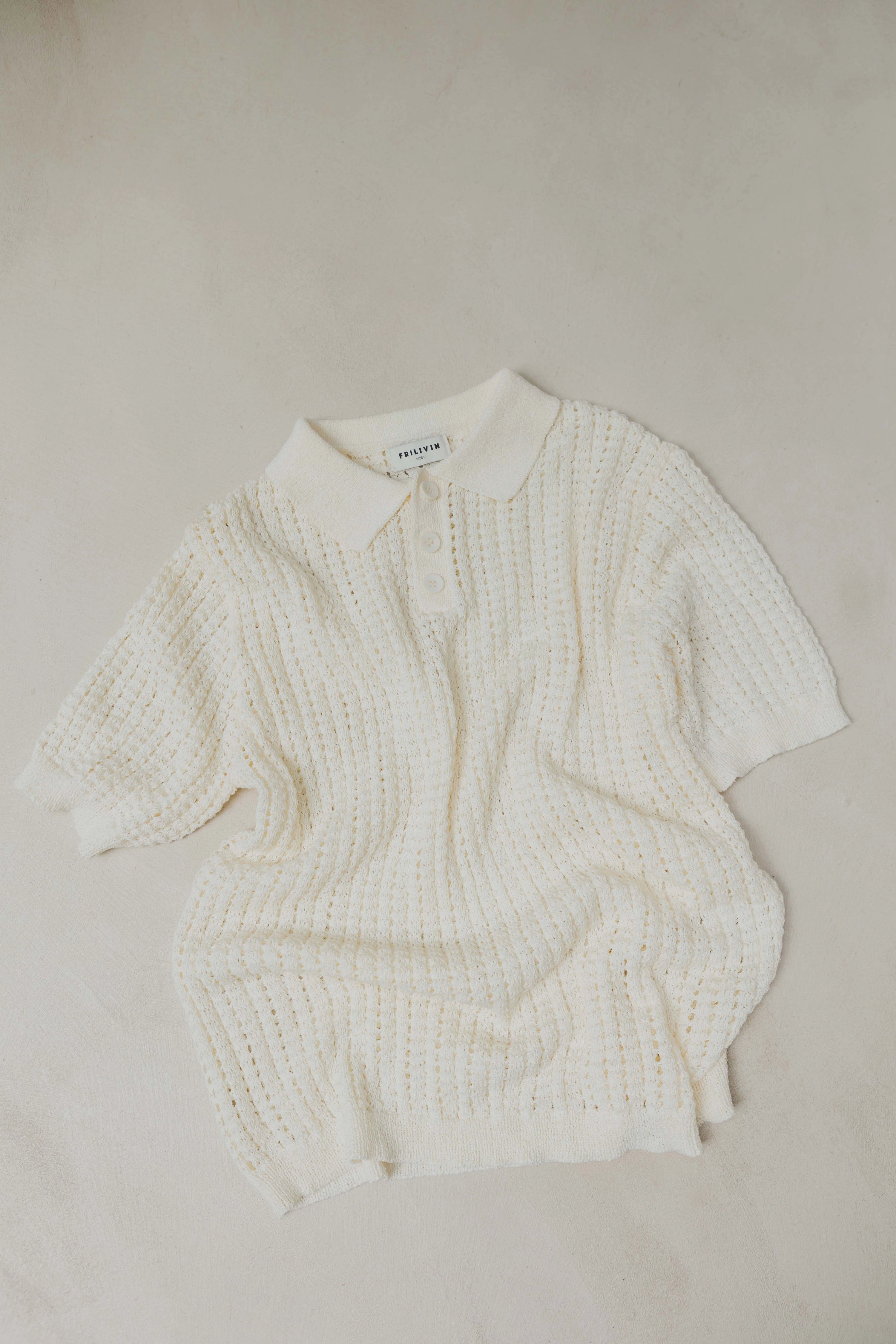 Polo troué uni à manches courtes