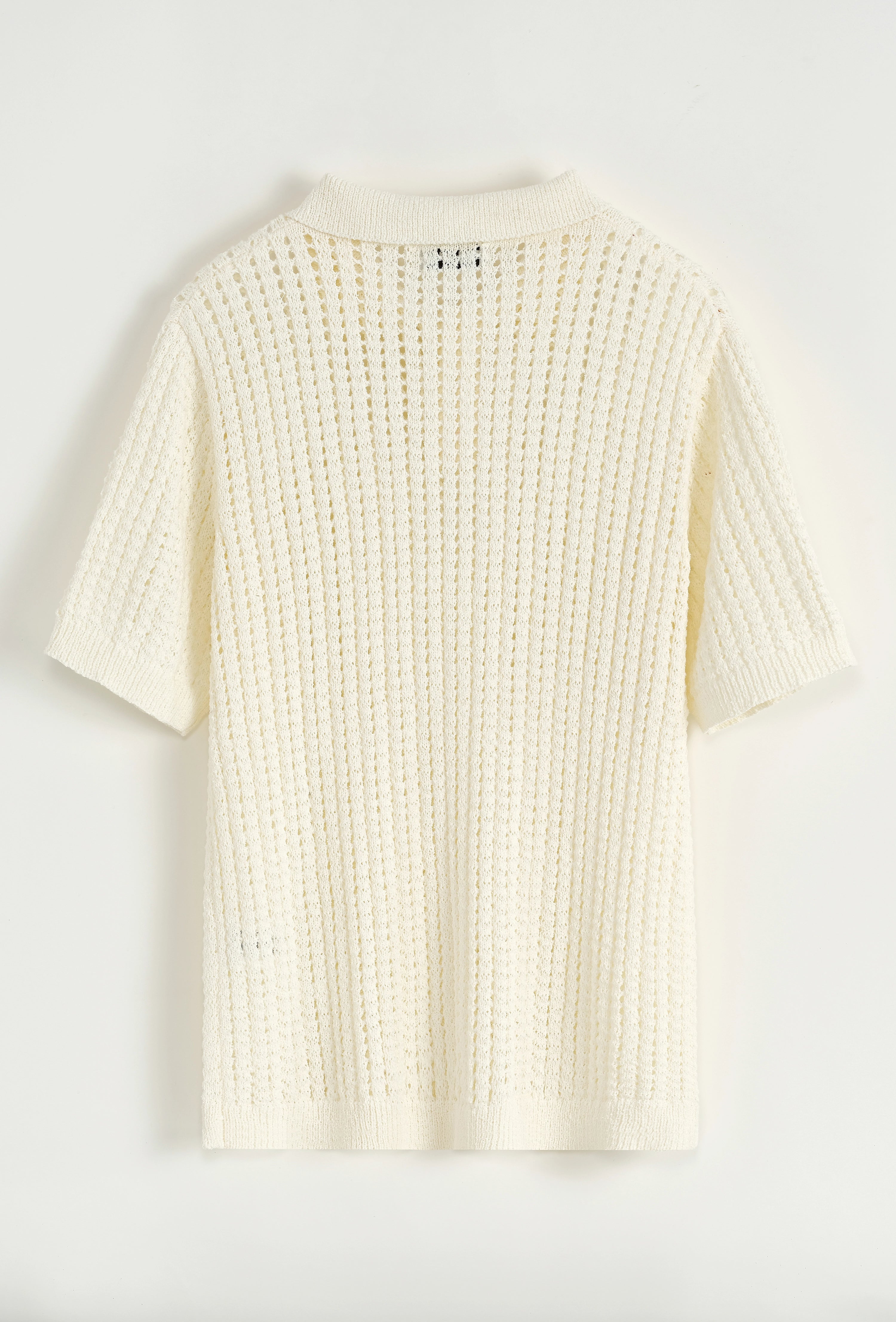 Polo troué uni à manches courtes