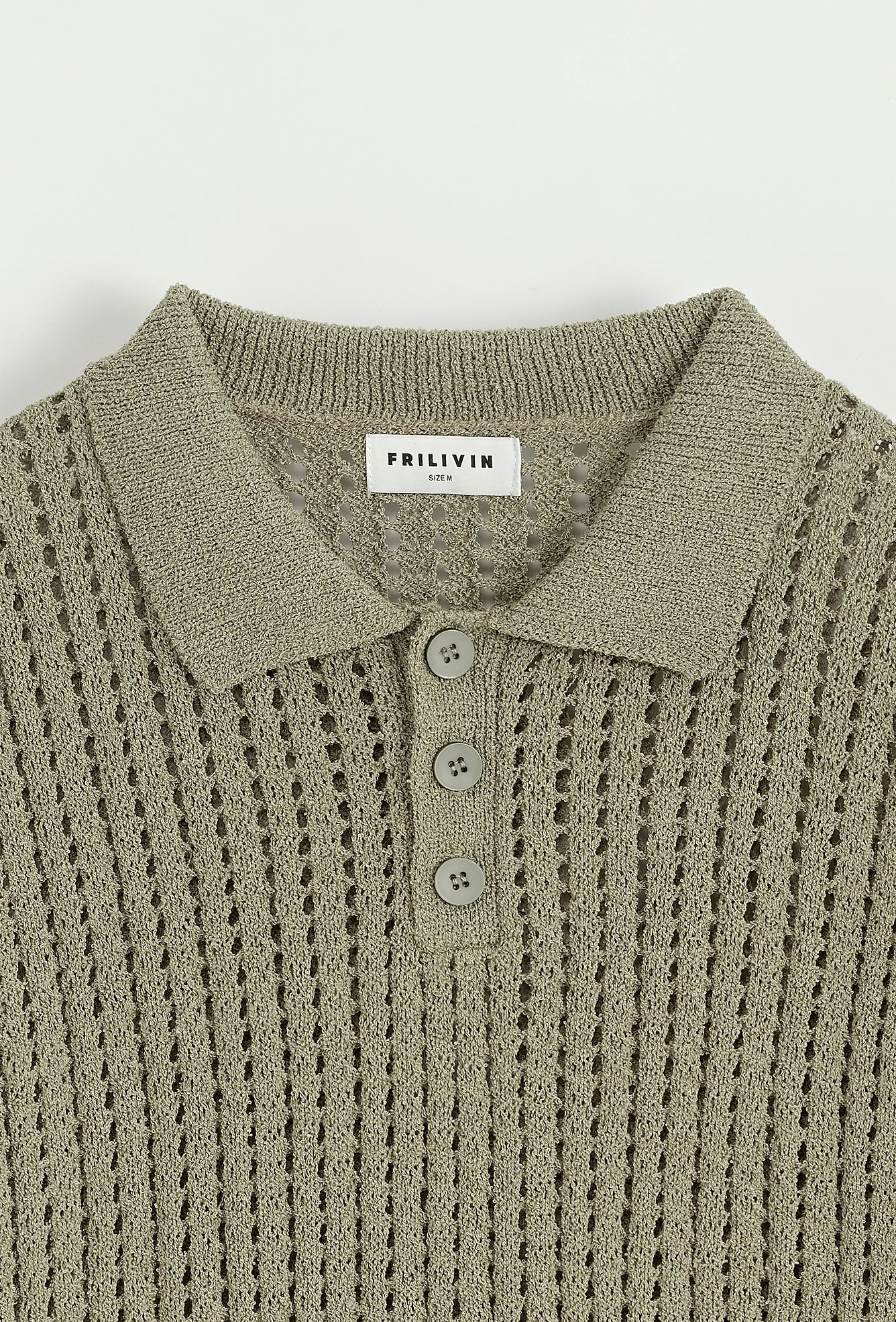 Polo troué uni à manches courtes