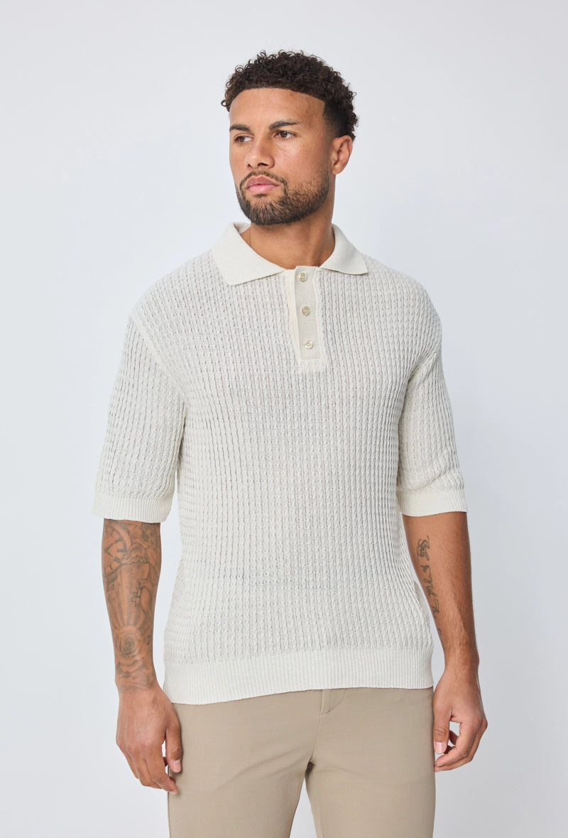 Polo uni manches courtes en maille