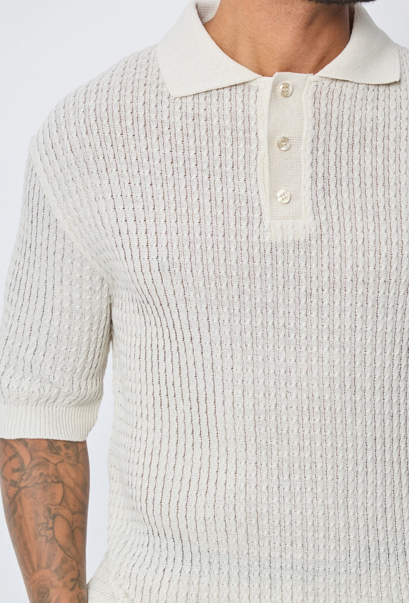 Polo uni manches courtes en maille