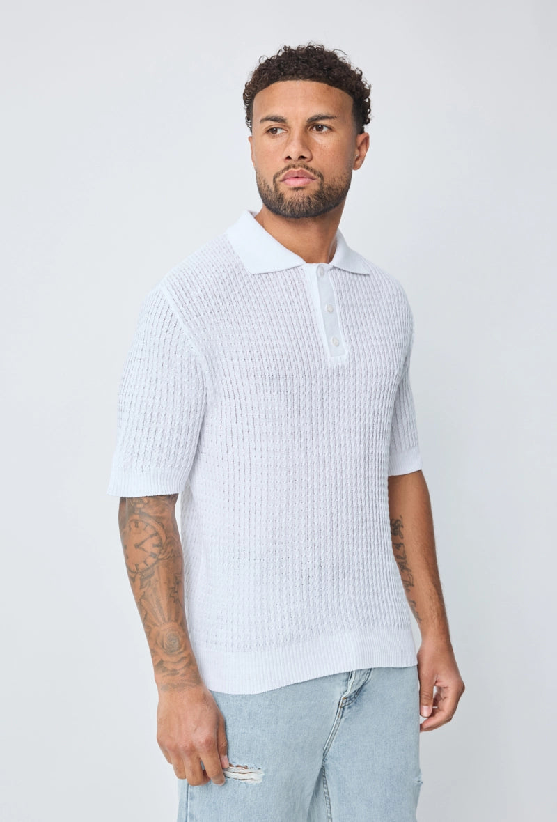 Polo uni manches courtes en maille