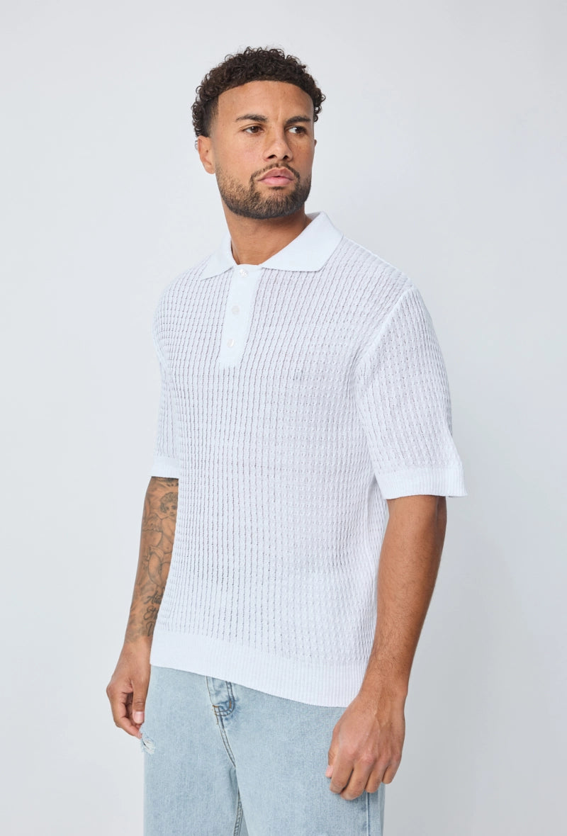 Polo uni manches courtes en maille