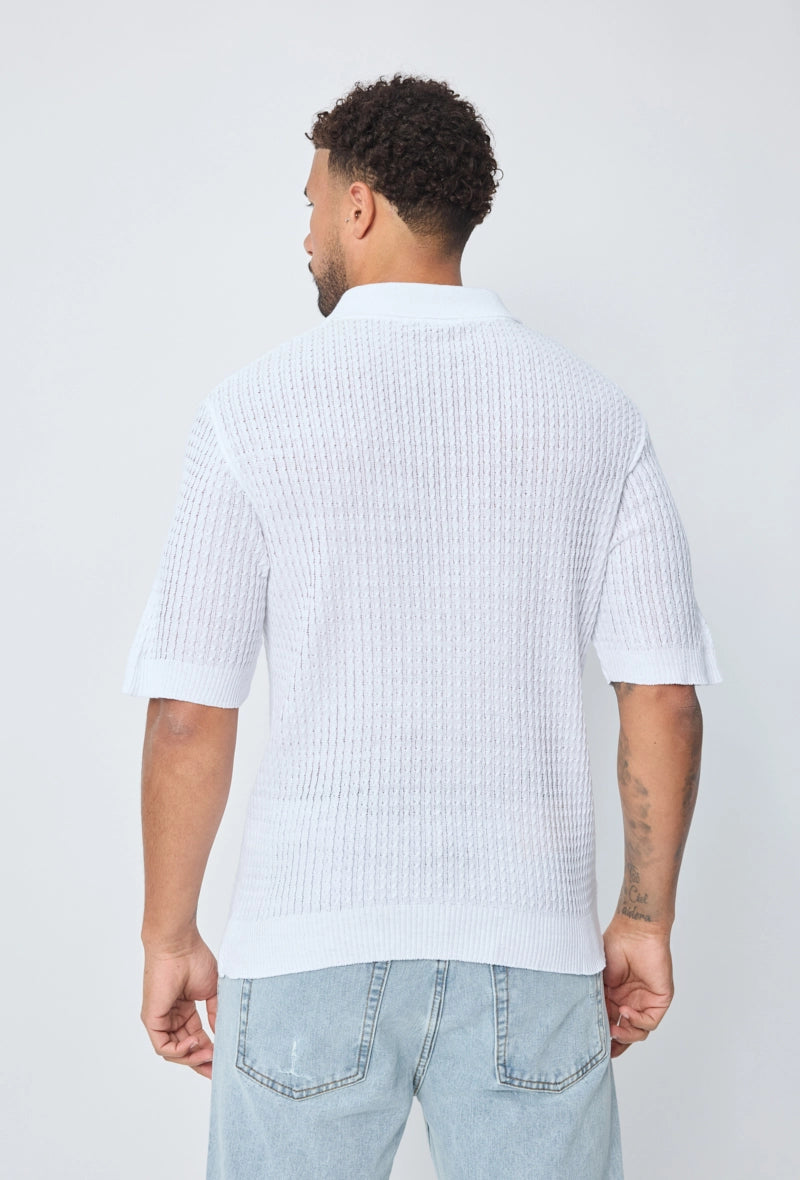 Polo uni manches courtes en maille