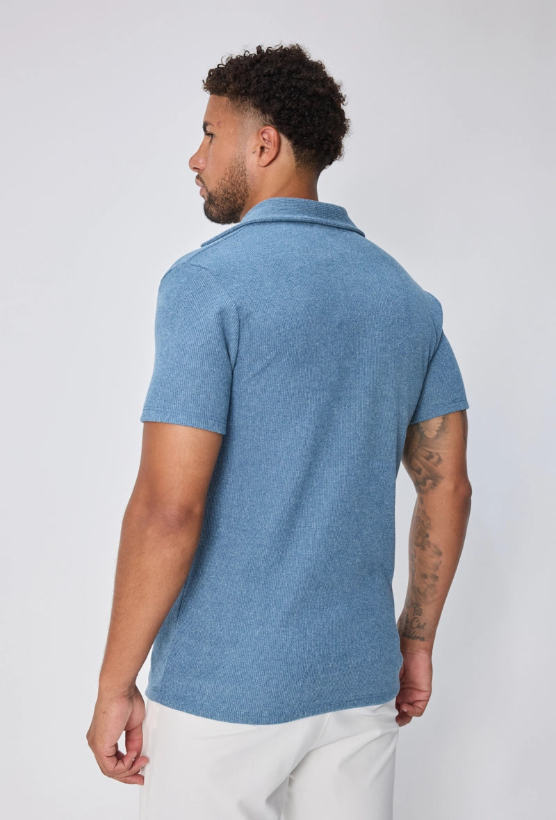 Polo uni col v à revers