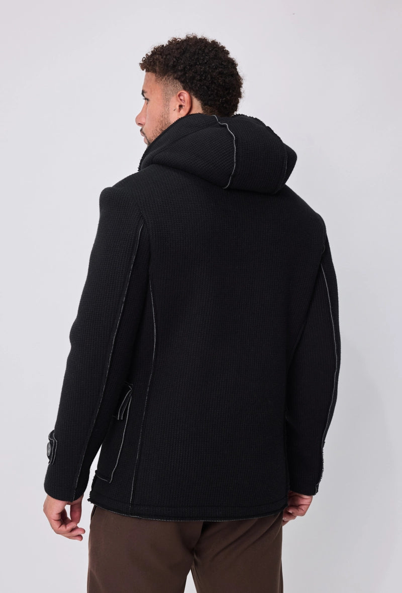 Manteau avec capuche et col large