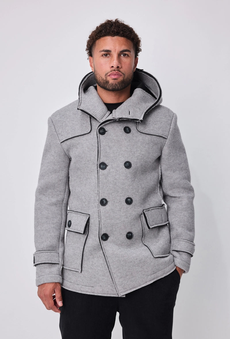 Manteau avec capuche et col large