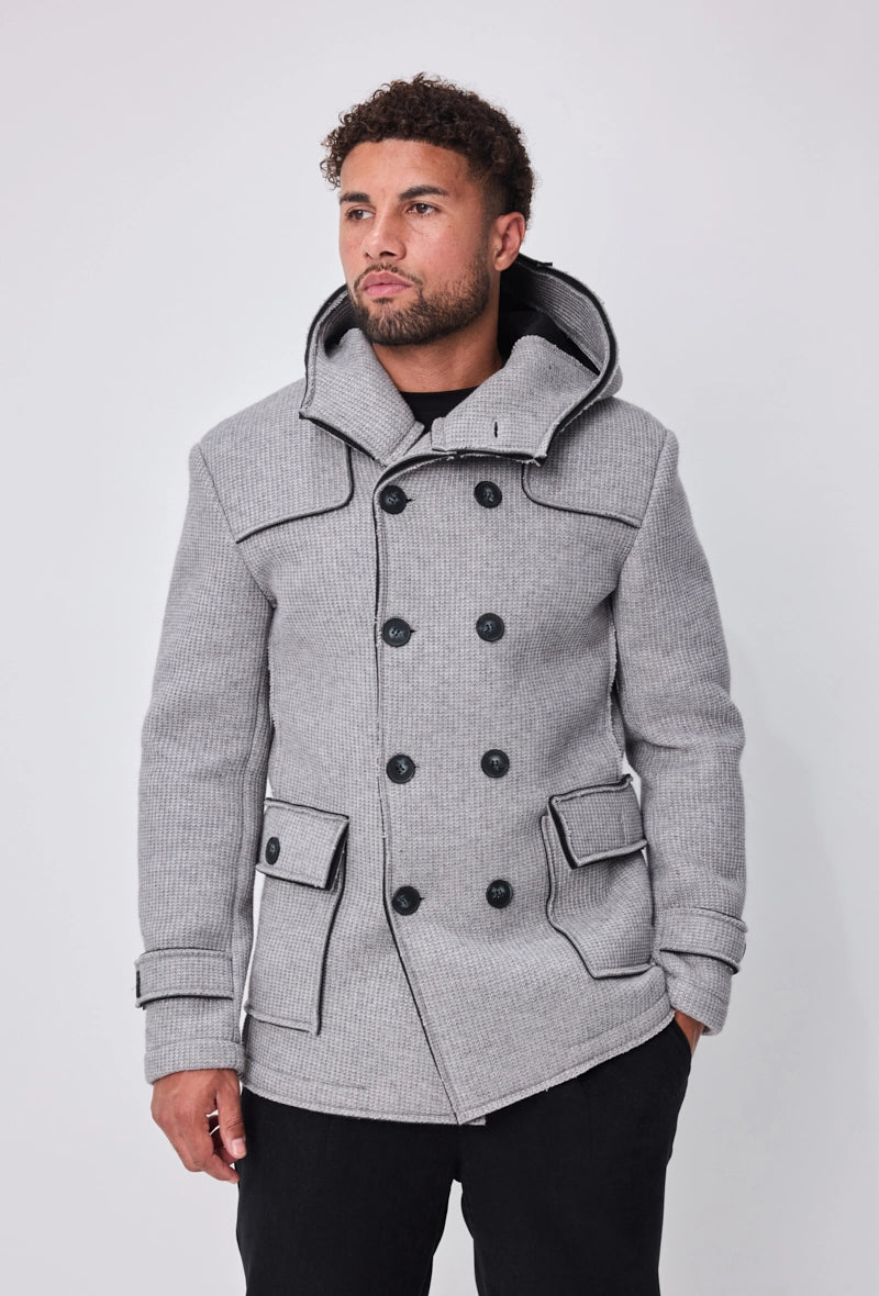 Manteau avec capuche et col large