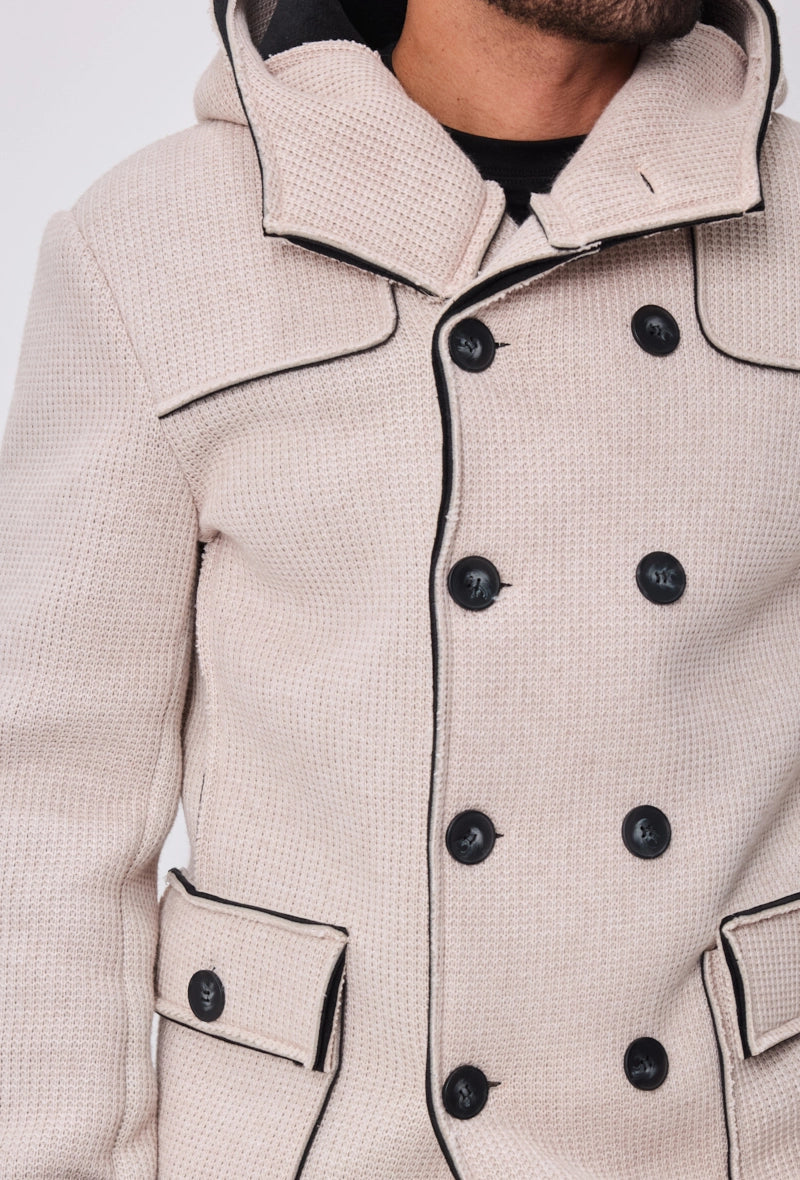 Manteau avec capuche et col large