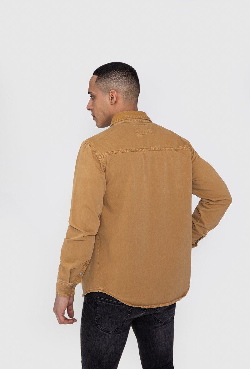 Surchemise jean cintrée à col classique avec finition usée - Frilivin