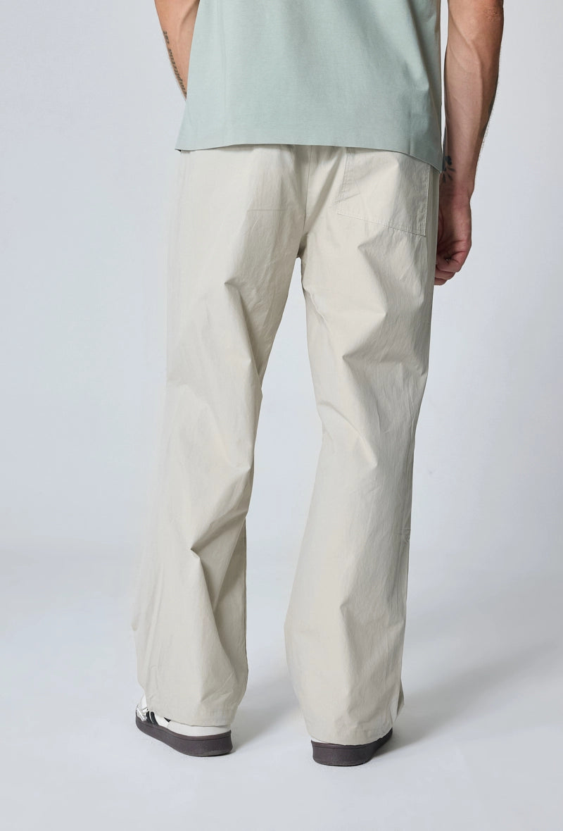 Pantalon parachute ajustable à la taille et aux cheville