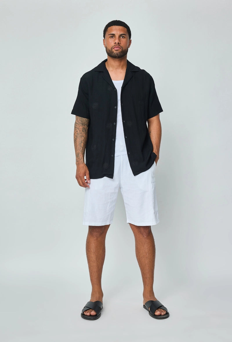 Chemise manches courtes à motifs fleuris