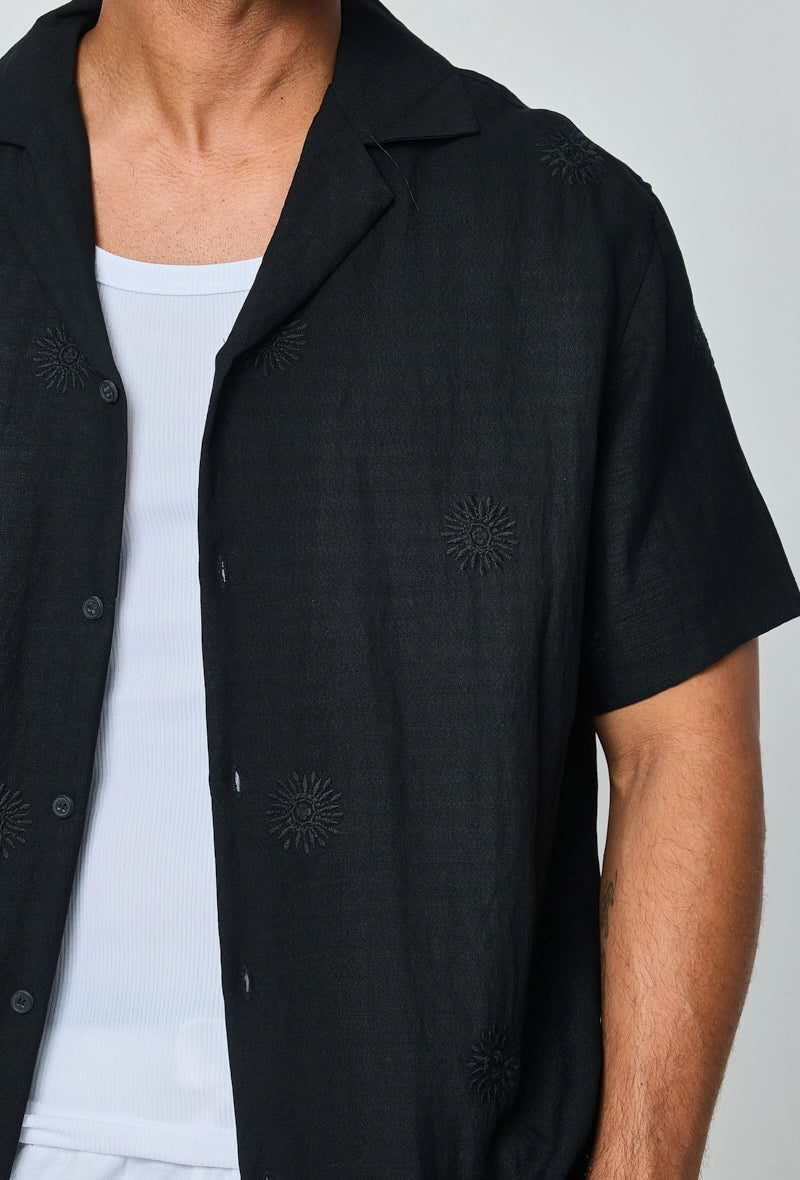 Chemise manches courtes à motifs fleuris