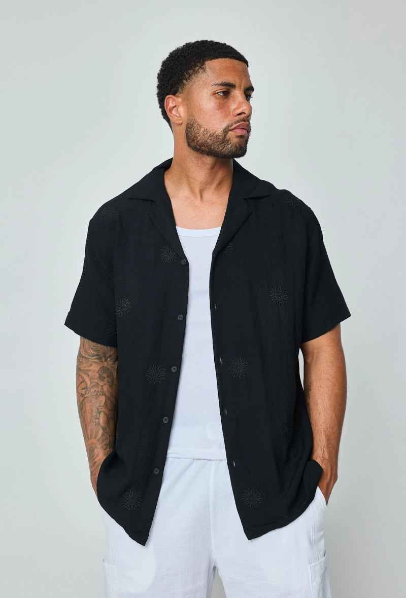 Chemise manches courtes à motifs fleuris