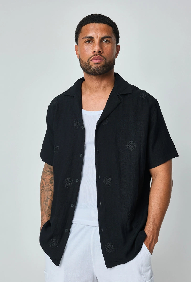 Chemise manches courtes à motifs fleuris