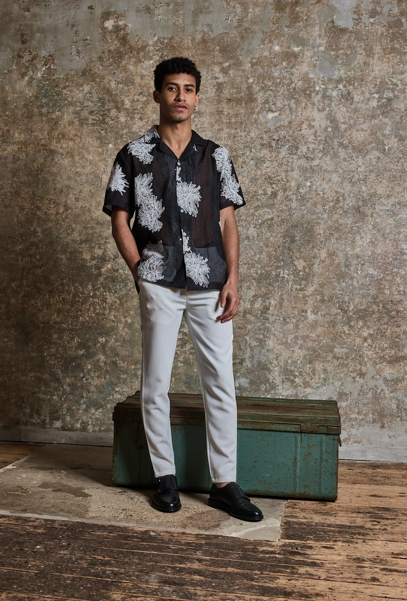 Chemise manches courtes à motifs fleuris broder