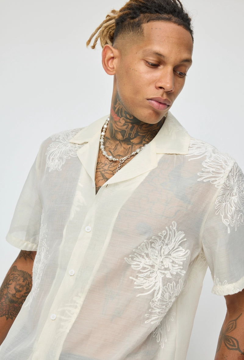 Chemise manches courtes à motifs fleuris broder