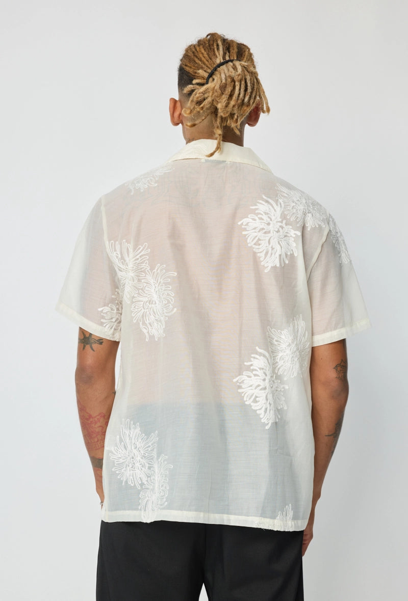 Chemise manches courtes à motifs fleuris broder