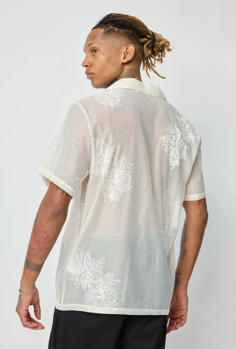 Chemise manches courtes à motifs fleuris broder