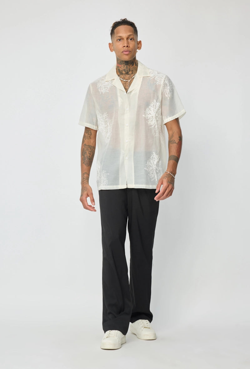 Chemise manches courtes à motifs fleuris broder