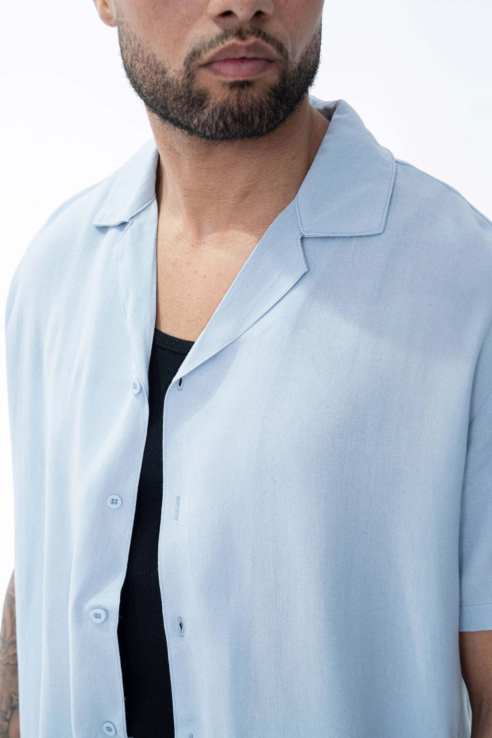 Chemise unie manches courtes