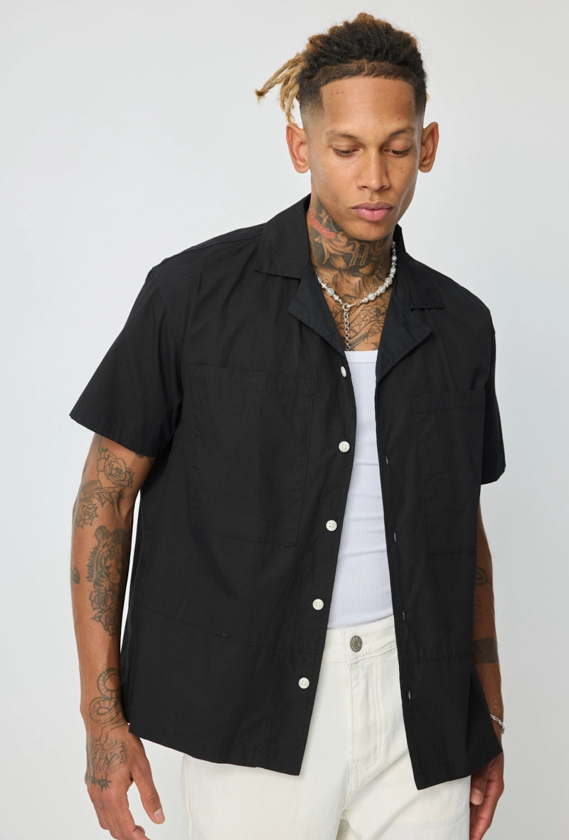 Chemise unie manches courtes