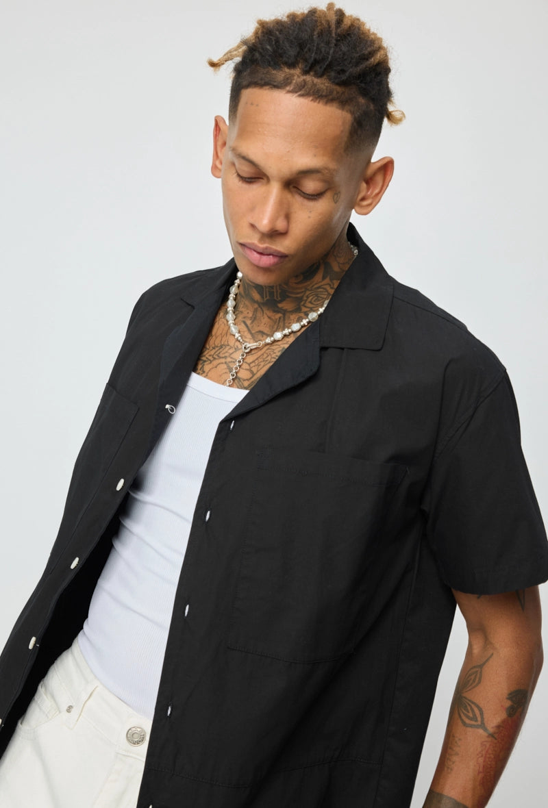 Chemise unie manches courtes