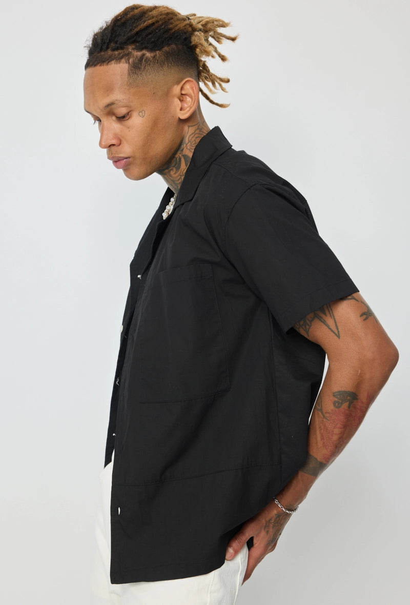 Chemise unie manches courtes