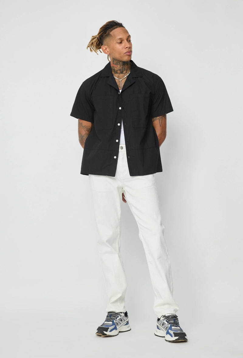 Chemise unie manches courtes