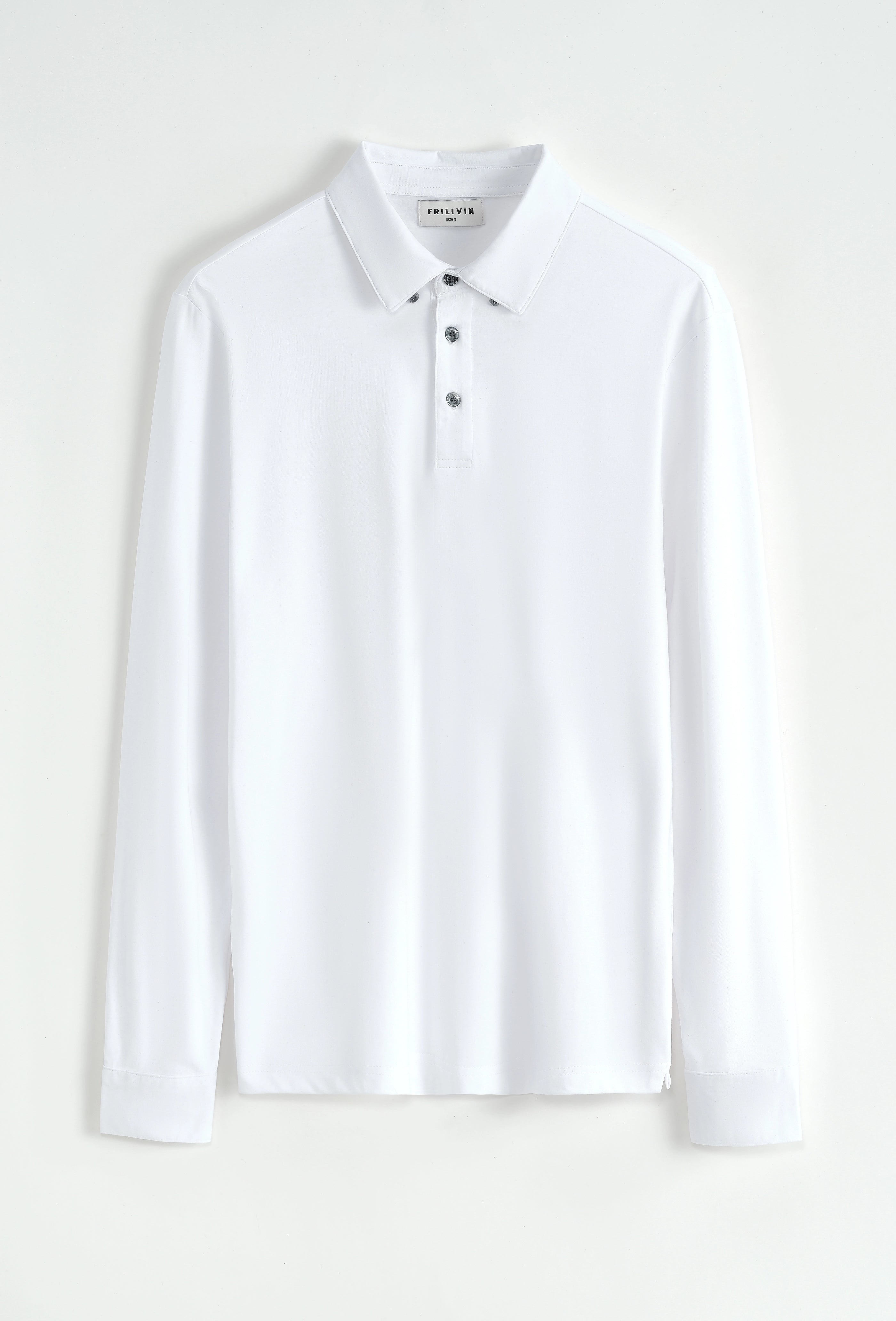 Polo uni à manches longues