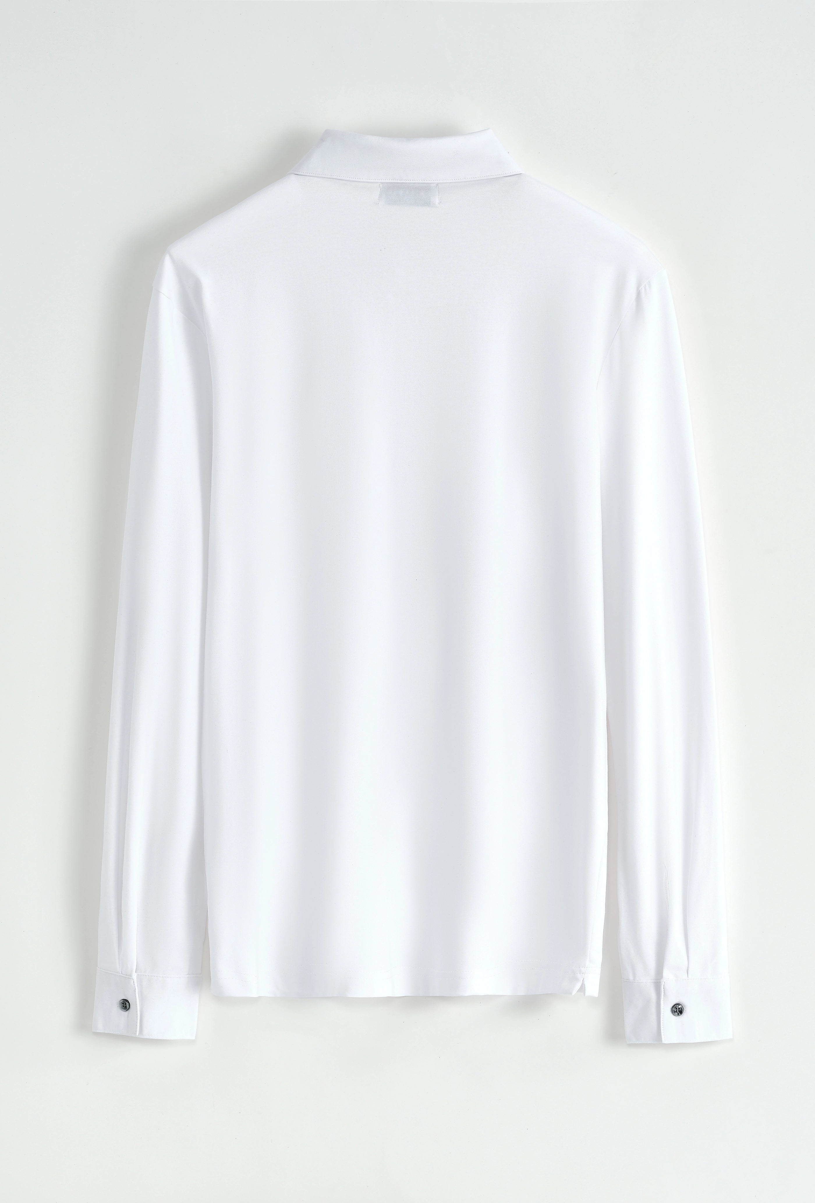 Polo uni à manches longues