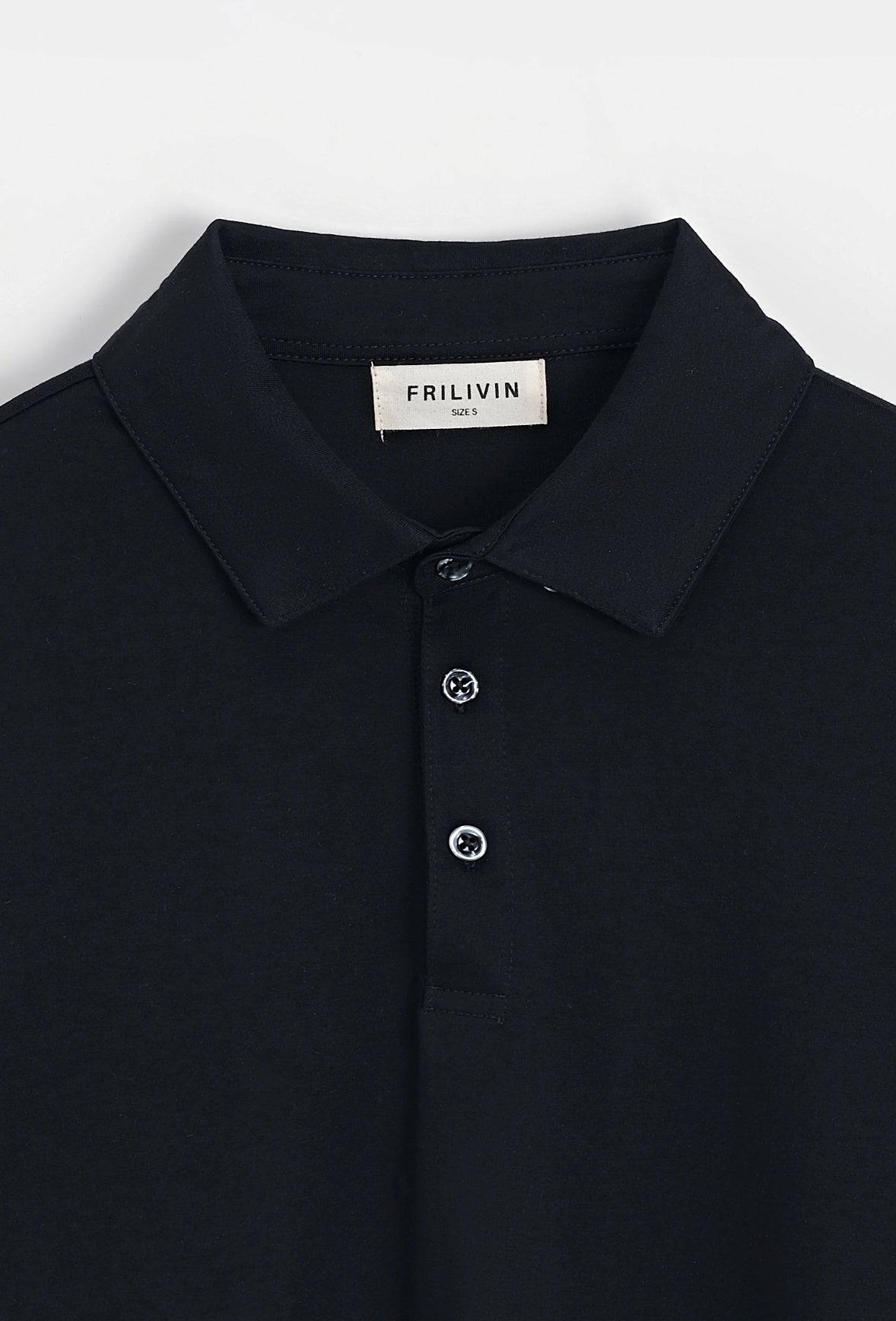 Polo uni à manches longues