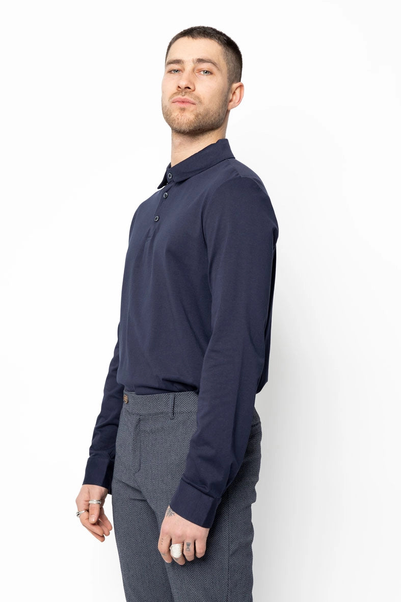 Polo uni à manches longues