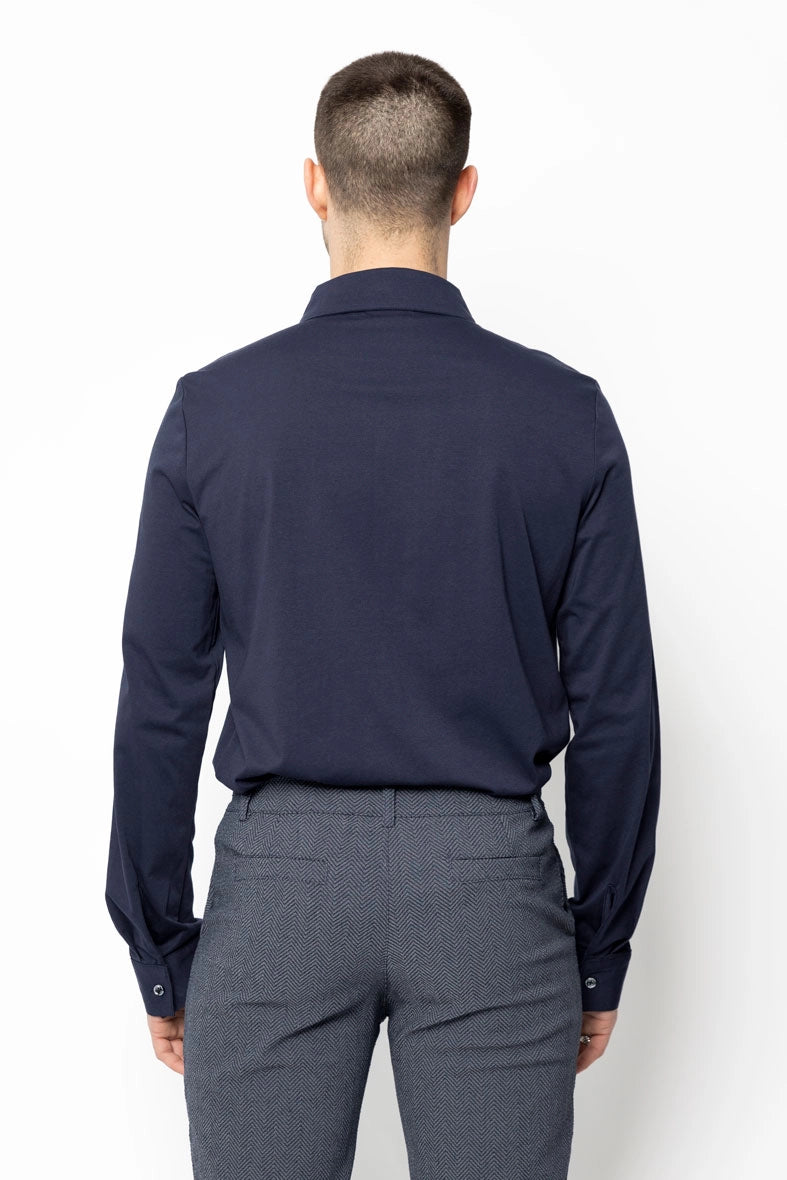 Polo uni à manches longues