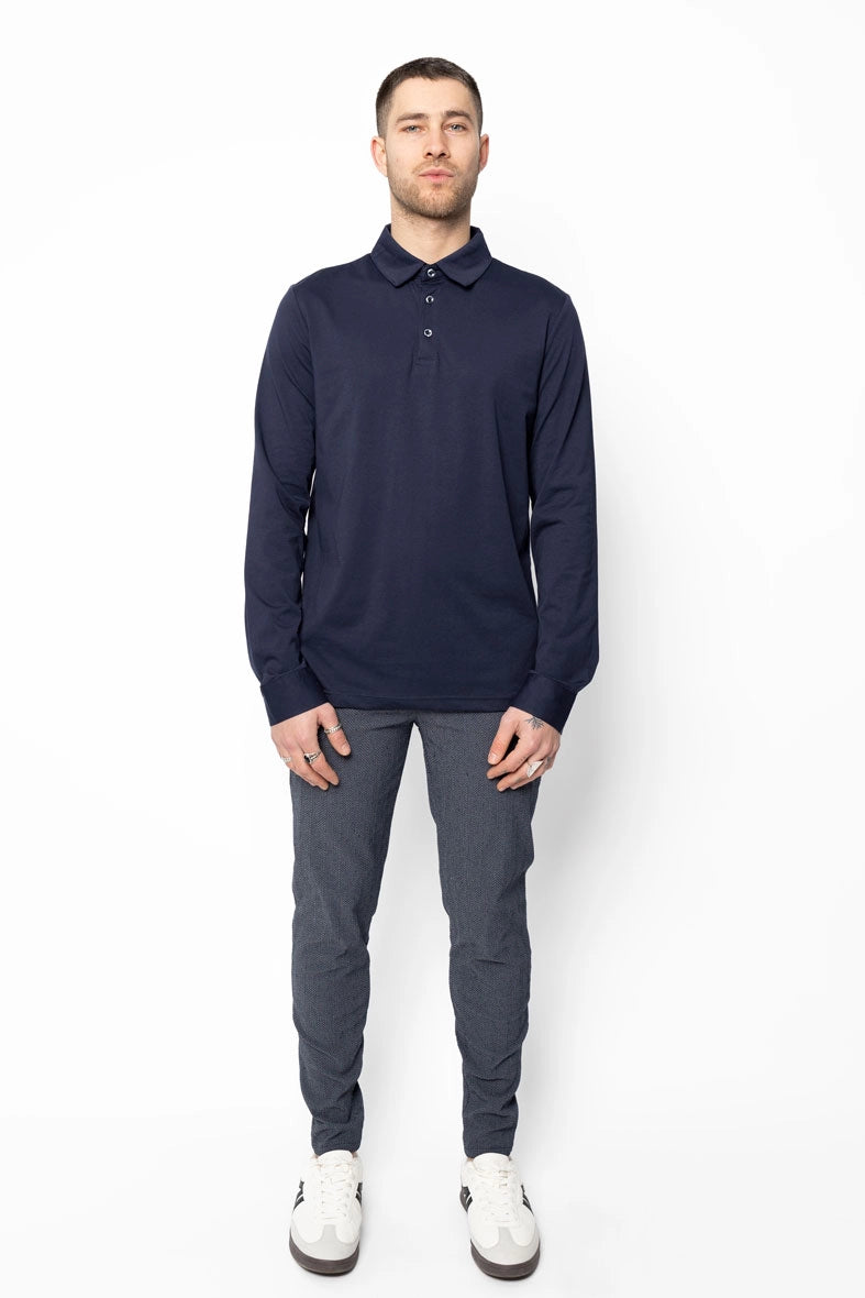 Polo uni à manches longues