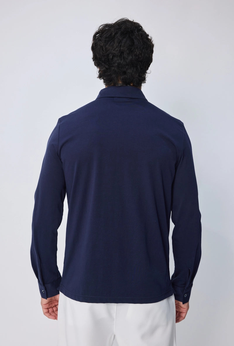 Polo uni à manches longues