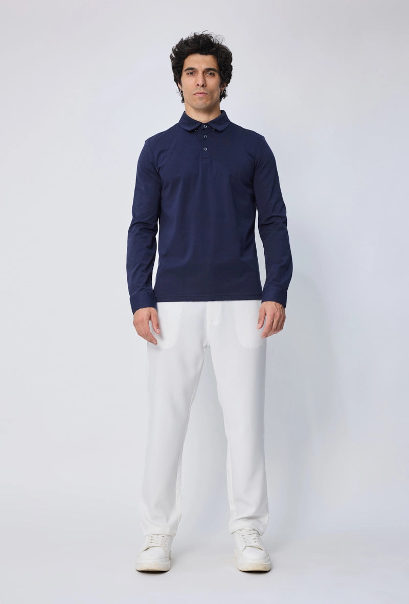 Polo uni à manches longues