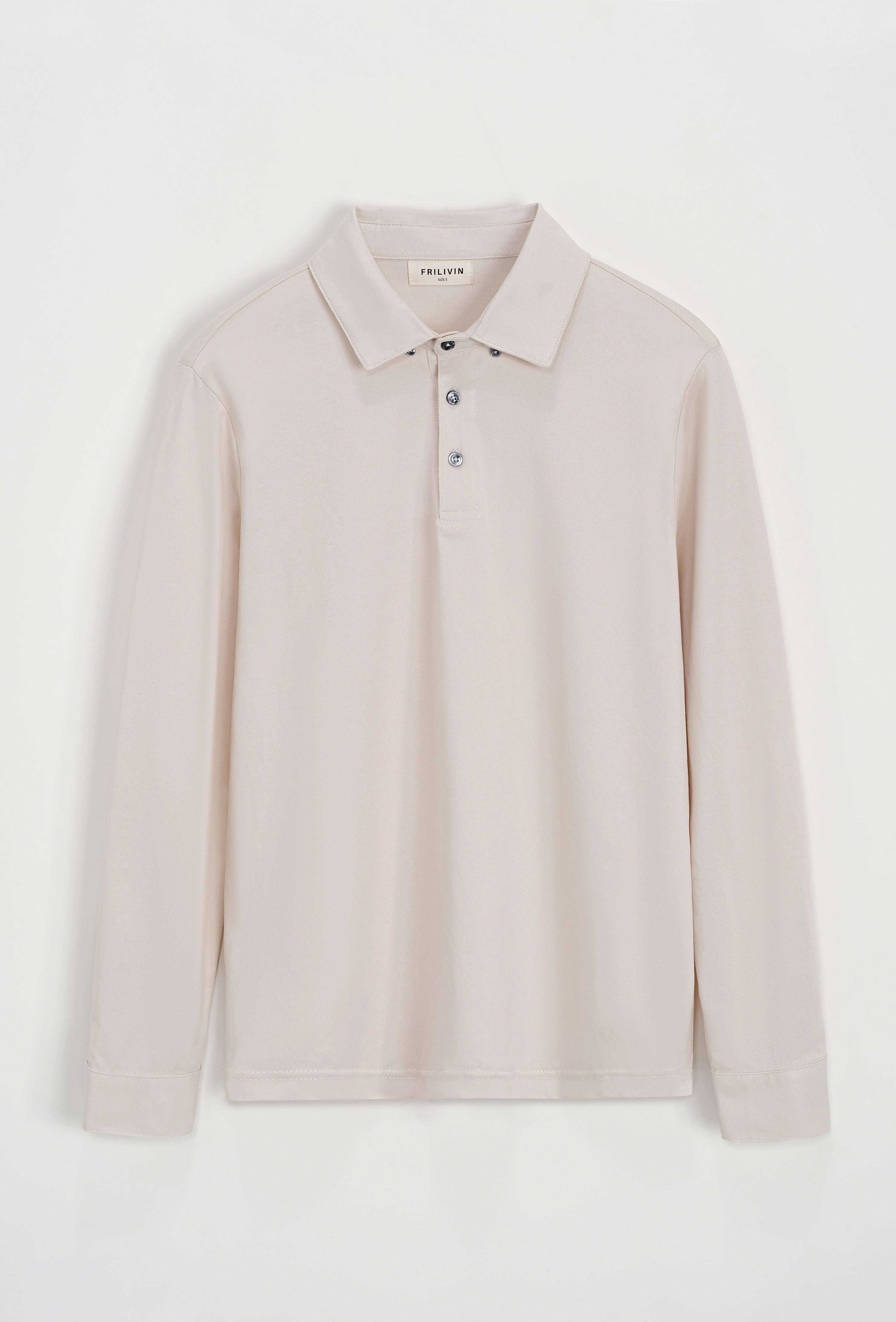 Polo uni à manches longues