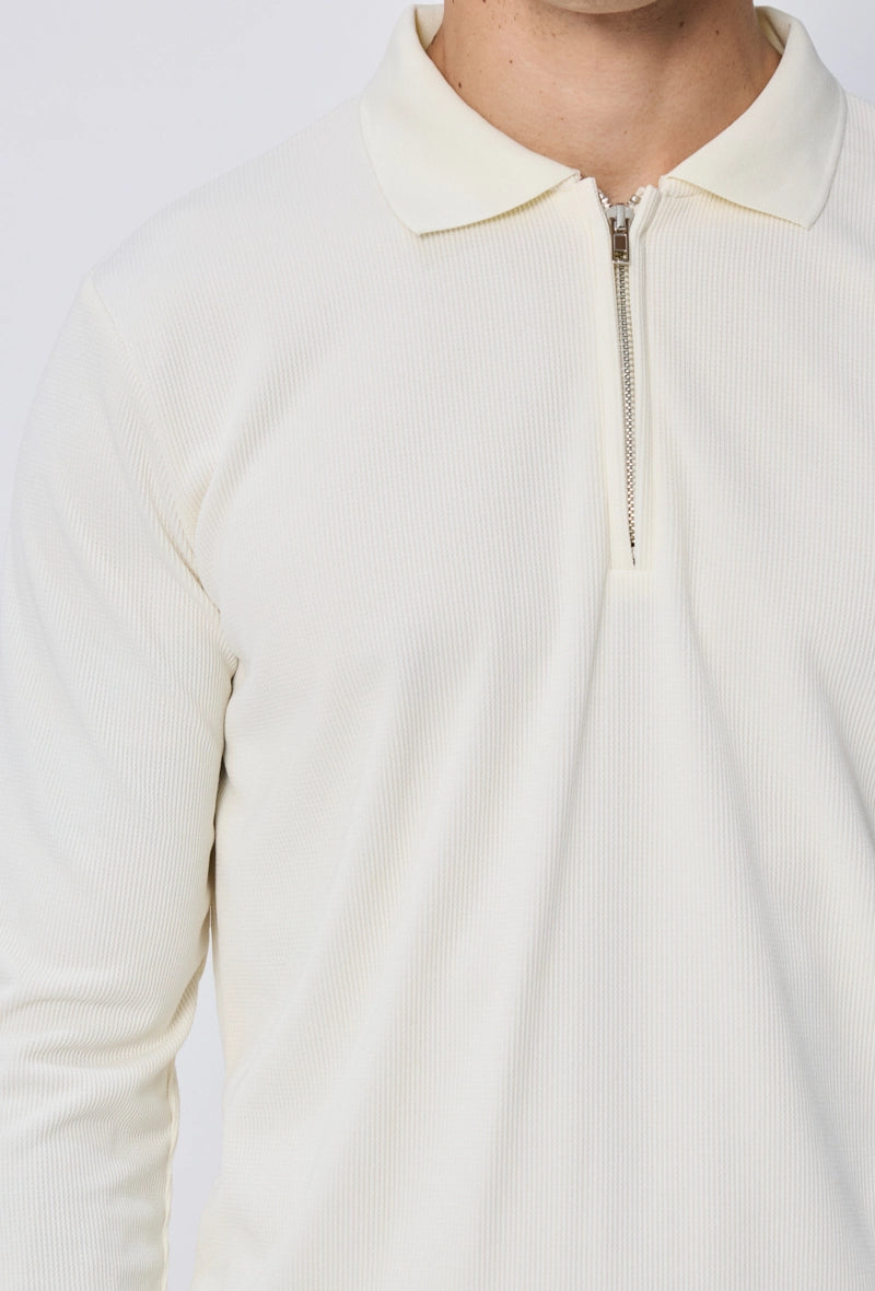 Polo à manches longues avec col zippé
