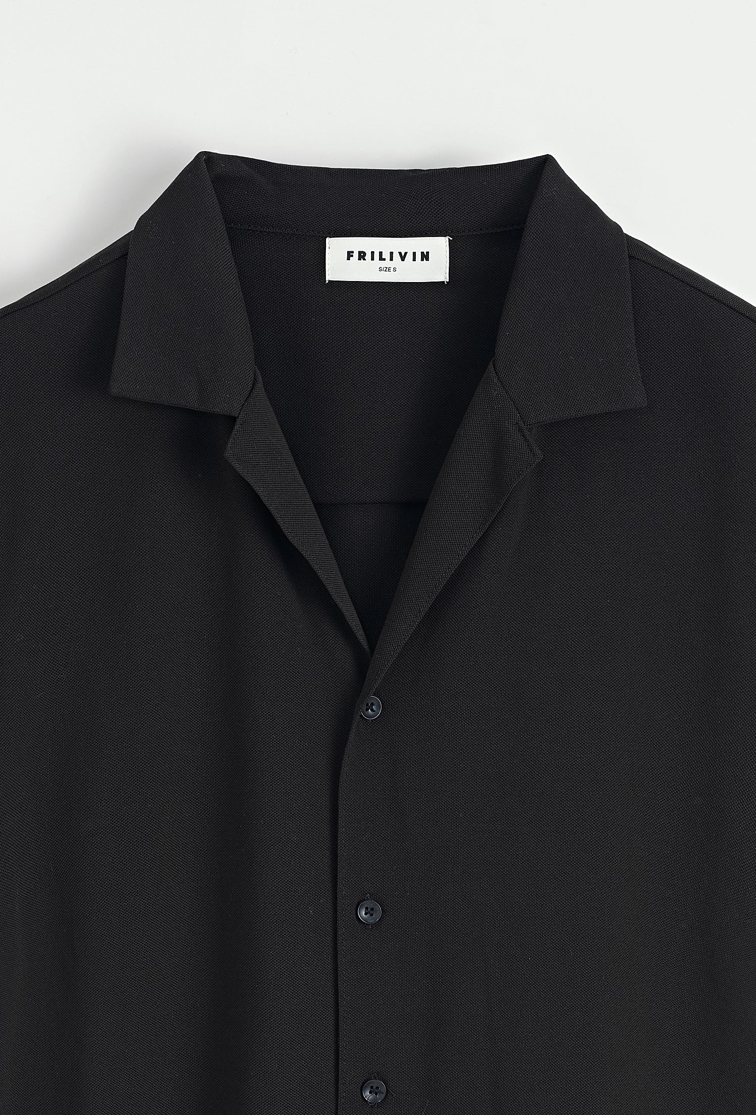 Chemise unie manches courtes